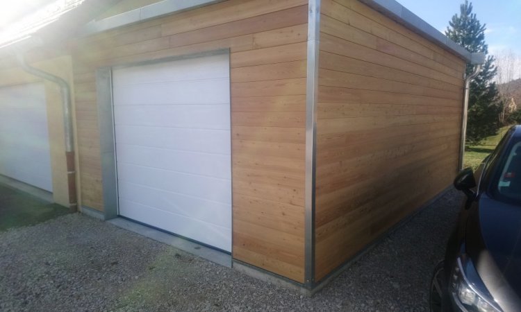 Construction d'un garage en ossature bois avec toit plat à Equevillon